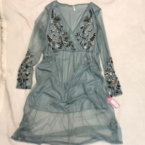 Blue mini dress with sheer overlay